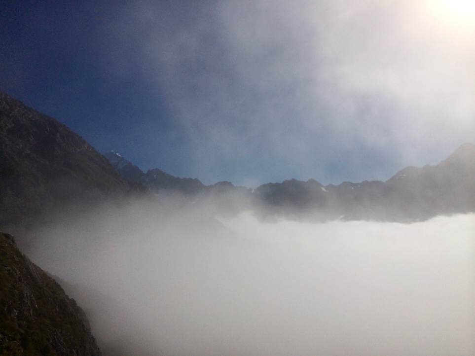 A glance at Aoraki/Mt. Cook before we go below the cloud-line.