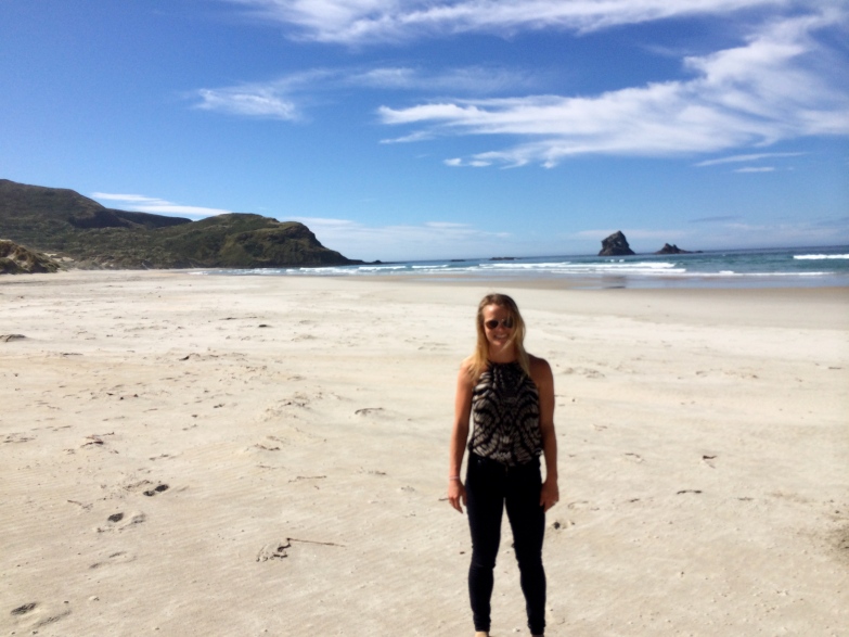 Me standing on Sandfly bay.  I like this photo because it's poorly focused and reminds me of the 70s.  Like if it were in black and white my mom could be next to me! 